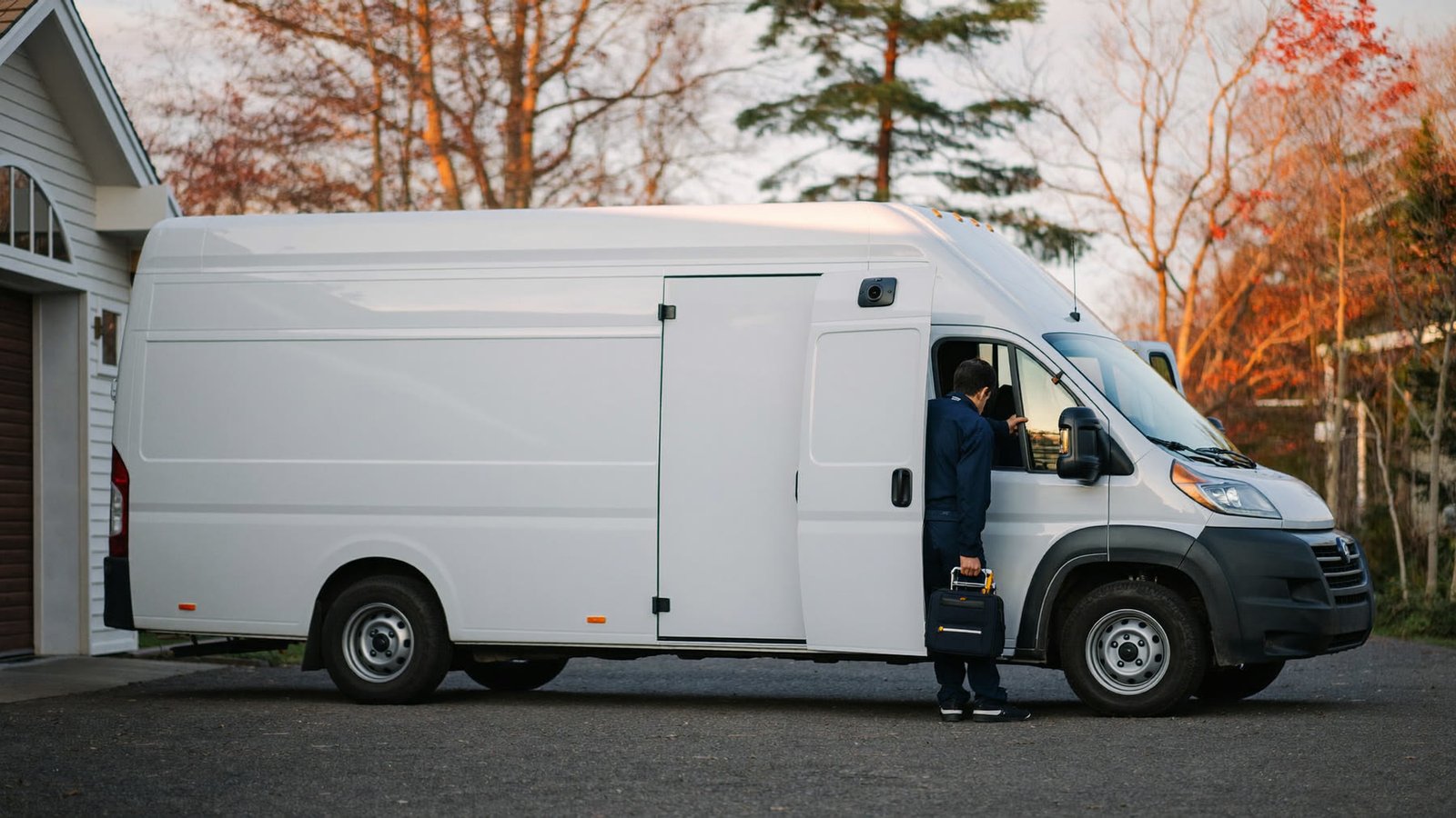 HEC Ottawa service van parked in an Ottawa driveway at dusk